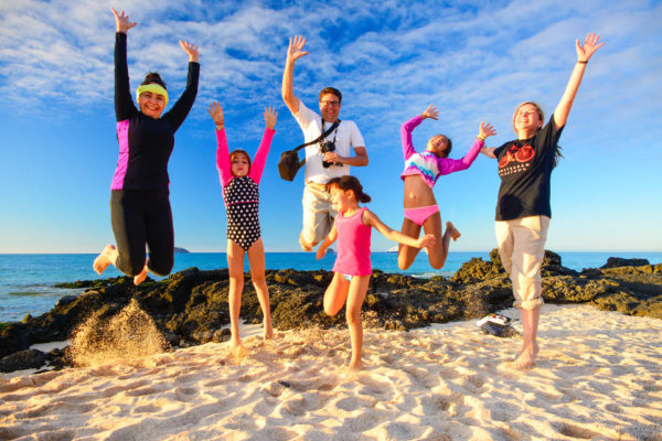 Family enjoying time at Galapagos beach.